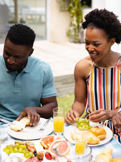 a family enjoying their food