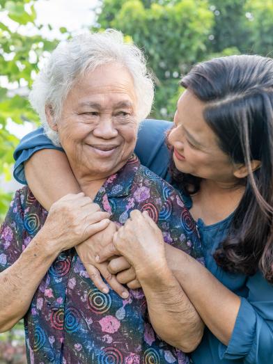 Asian-elderly-woman-with-caregiver-walking