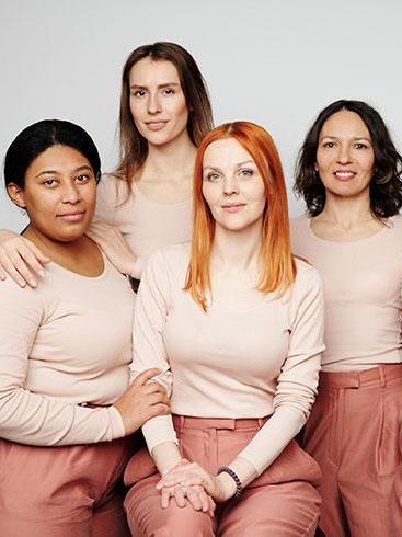 Group of five women of various ages and ethnicities