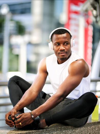 African American man stretching before a run