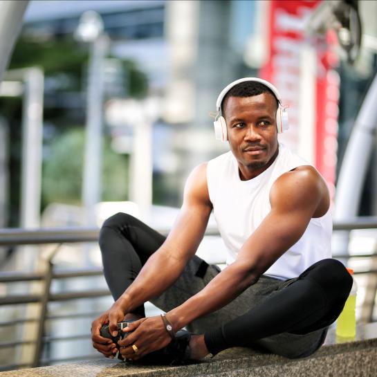 African American man stretching before a run