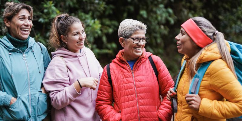 Multigenerational women hiking on fall day