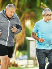 Two senior men getting a walking workout outside