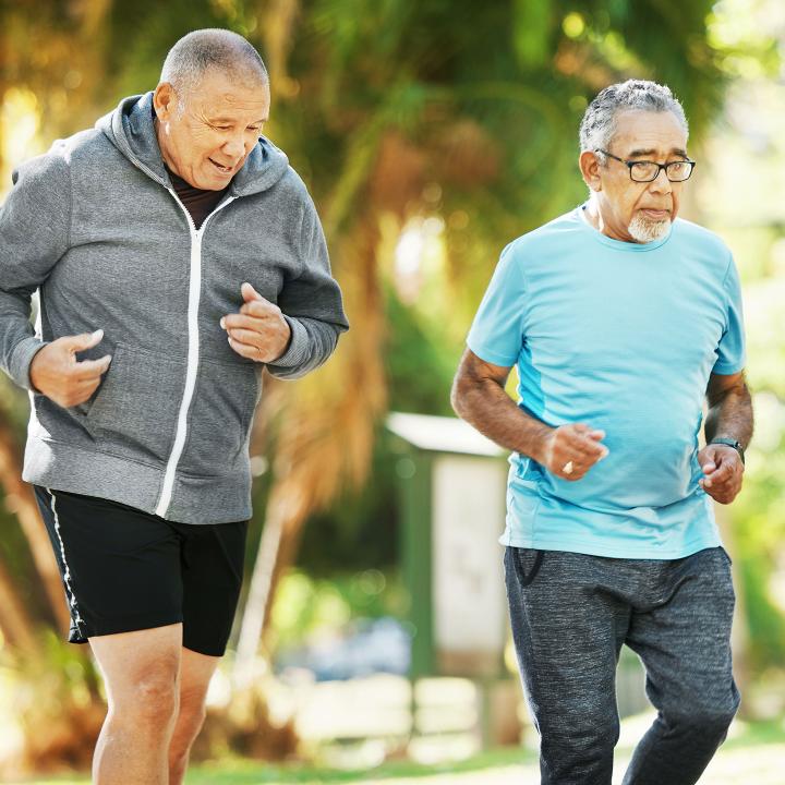 Two senior men getting a walking workout outside