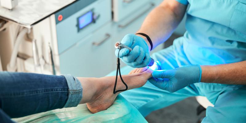 Doctor examining patient's foot