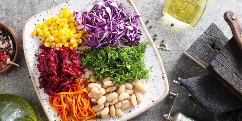 chopped vegetables on plate ready to be made into a salad