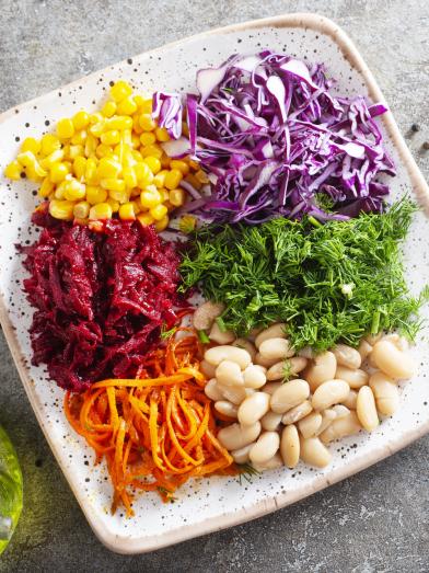 chopped vegetables on plate ready to be made into a salad