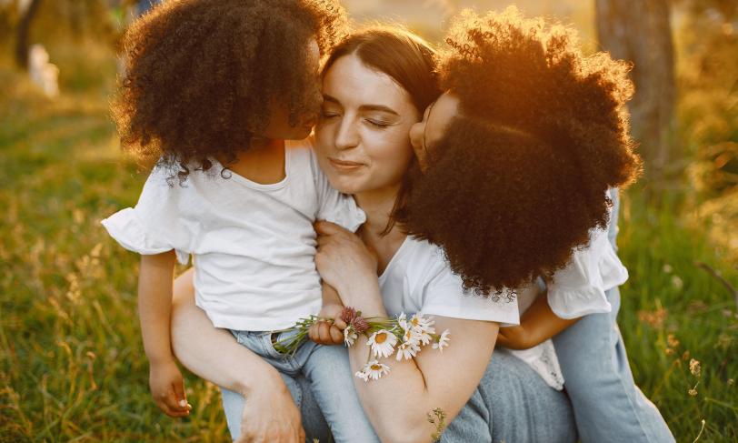 Mother with her young daughters