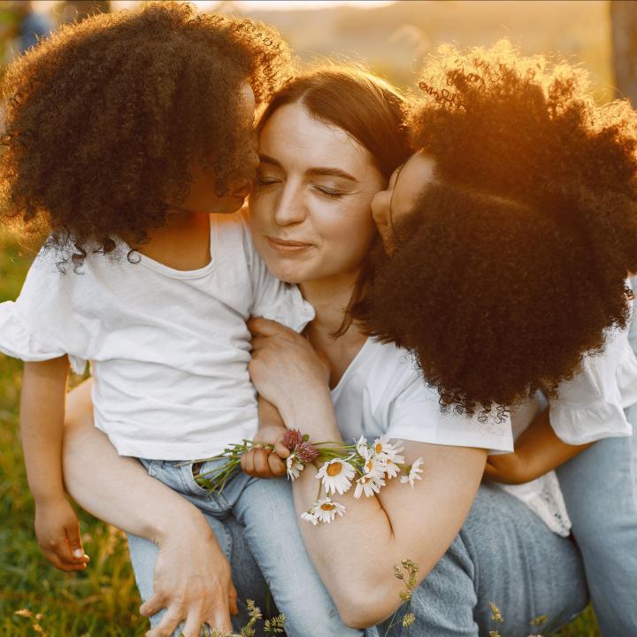 Mother with her young daughters