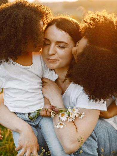 Mother with her young daughters