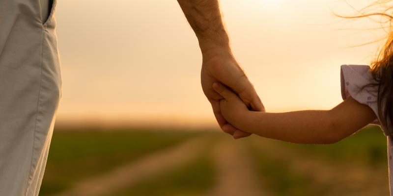 Father and Daughter Holding Hands