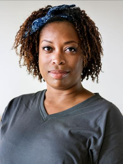 African American woman looking directly at camera