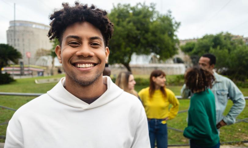 Smiling young Latino male