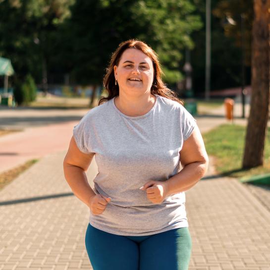 Woman Running in Park