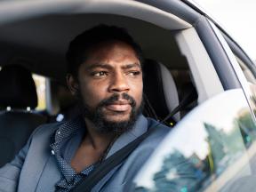 A man sitting in the car