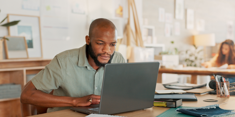 A man searching the laptop