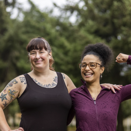 Smiling women in park